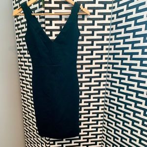 GORGEOUS black fitted mini dress.